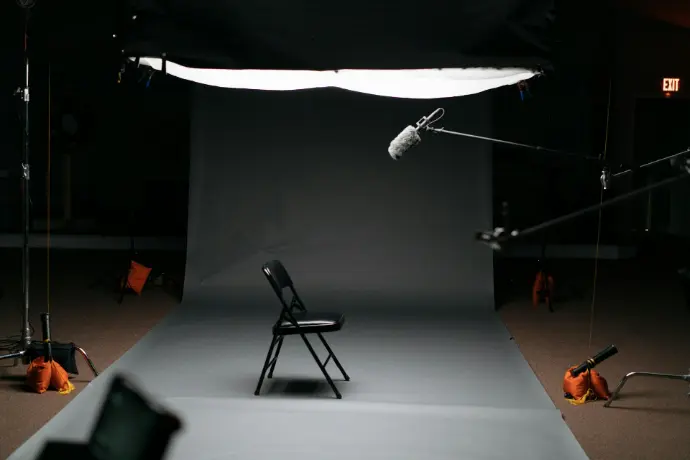 empty black folding chair on canvas